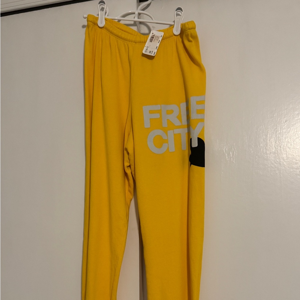 NWT FREECITY size XS yellow sweats NEW WITH TAG